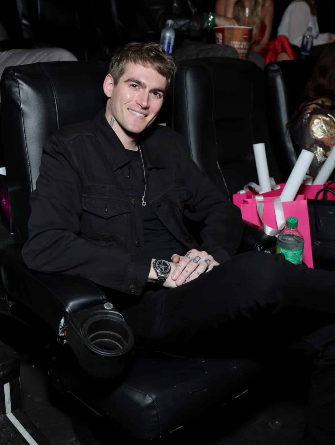 Presley Gerber attends Paris Hilton’s "Infinite Icon: A Visual Memoir" Los Angeles premiere event on January 20, 2026, smiling from his seat at the screening. | Source: Getty Images
